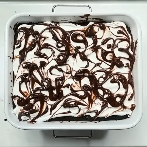 Marshmallow Chocolate Poke Cake